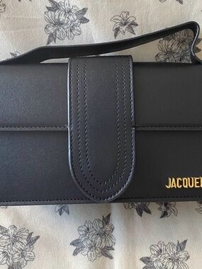 Jacquemus Black Leather Clutch with Gold Logo